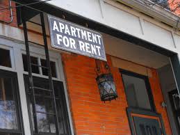 Apartment for rent sign.