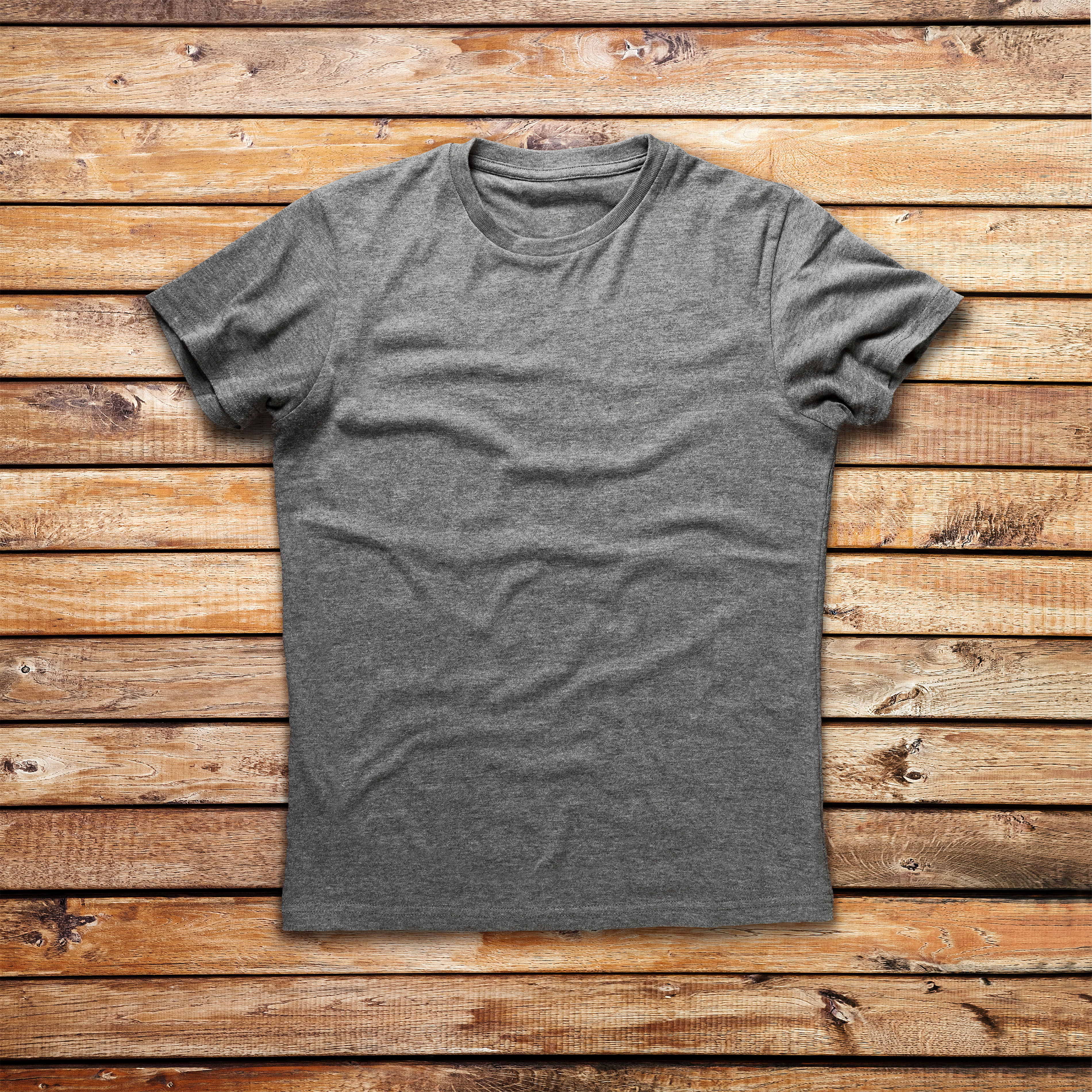 Grey shirt over wood background